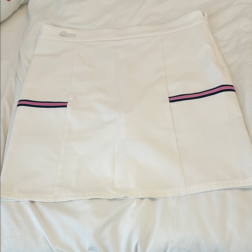 Lyle and Scott Golf Performance  Mini Skort with Pink & Navy Stripe Detail.